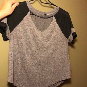 Grey tee with mesh sleeves & cut neck.